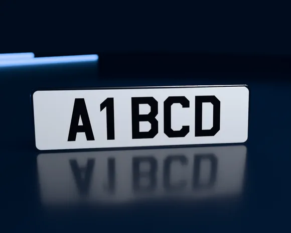 A short white number plate reading A1 BCD