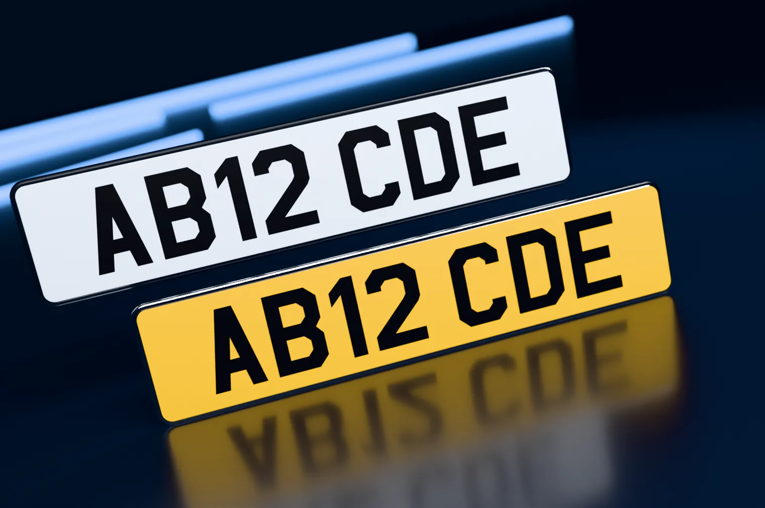 A white front and a yellow rear standard number plate with flat printed black characters
